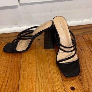 Strappy black heels